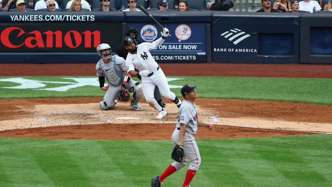 Aug 30, 2026; Bronx, New York, USA;  New York Yankees outfielder Heliot Ramos (34) hits a home run during the fifth inning against the Boston Red Sox at Yankee Stadium.  Mandatory Credit: Vincent Carchietta-Imagn Images
