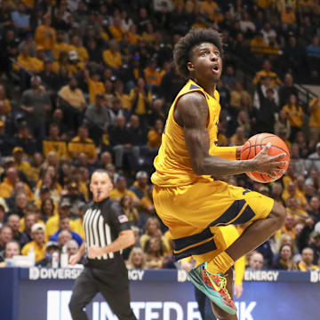 Nov 13, 2025; Morgantown, West Virginia, USA; West Virginia Mountaineers guard Honor Huff (3) makes a move in the lane and shoots during the second half against the Pittsburgh Panthers at WVU Coliseum. Mandatory Credit: Ben Queen-Imagn Images