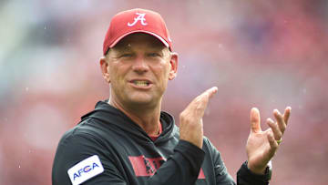 Aug 31, 2024; Tuscaloosa, Alabama, USA;  Alabama Crimson Tide head coach Kalen DeBoer coaches his players during warm ups before their game against the Western Kentucky Hilltoppers at Bryant-Denny Stadium. Mandatory Credit: Will McLelland-Imagn Images