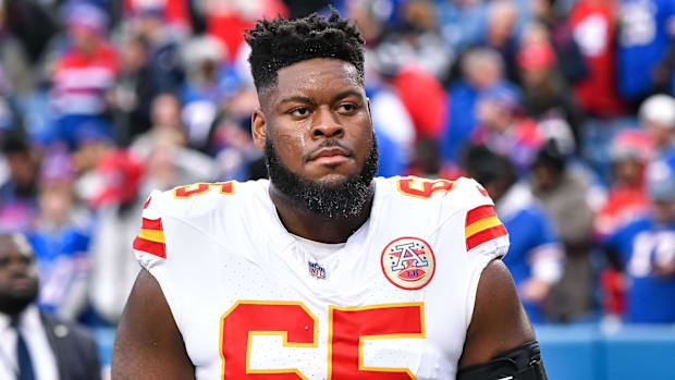 Kansas City Chiefs guard Trey Smith (65) leaves the field after warm ups