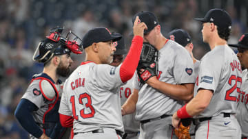 Jun 17, 2024; Toronto, Ontario, CAN;  Boston Red Sox manager Alex Cora (13) gestures to the bullpen as he relieves pitcher Brad Keller (46) in the ninth inning against the Toronto Blue Jays at Rogers Centre. Mandatory Credit: Dan Hamilton-USA TODAY Sports