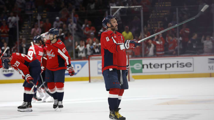 Apr 28, 2024; Washington, District of Columbia, USA; Washington Capitals left wing Alex Ovechkin (8) offers his stick to a young fan prior to leaving the ice after the Capitals game against the New York Rangers in game four of the first round of the 2024 Stanley Cup Playoffs at Capital One Arena. Mandatory Credit: Geoff Burke-USA TODAY Sports