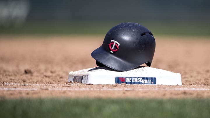 Apr 28, 2018; Minneapolis, MN, USA; A general view of a Minnesota Twins helmet on top of first base during the fifth inning against the Cincinnati Reds at Target Field. Mandatory Credit: Jesse Johnson-Imagn Images