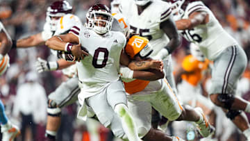 Mississippi State quarterback Michael Van Buren Jr. (0) is taken down by Tennessee defensive lineman Bryson Eason (20) during a college football game between Tennessee and Mississippi State at Neyland Stadium in Knoxville, Tenn., on Saturday, Nov. 9, 2024.