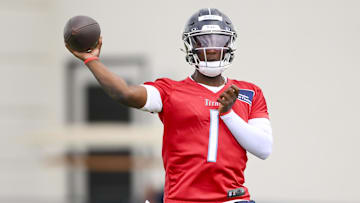 May 10, 2025; Nashville, TN, USA;  Tennessee Titans quarterback Cam Ward (1) throws during drills during Rookie Mini Camp at Saint Thomas Sports Park. Mandatory Credit: Steve Roberts-Imagn Images