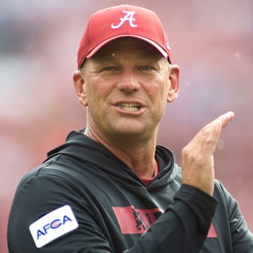 Aug 31, 2024; Tuscaloosa, Alabama, USA;  Alabama Crimson Tide head coach Kalen DeBoer coaches his players during warm ups before their game against the Western Kentucky Hilltoppers at Bryant-Denny Stadium. Mandatory Credit: Will McLelland-Imagn Images