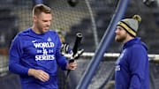 Oct 27, 2024; New York, NY, USA; Los Angeles Dodgers first baseman Freddie Freeman (5) and third baseman Max Muncy (13) work out on the field a day before game three of the World Series against the New York Yankees at Yankees Stadium. 