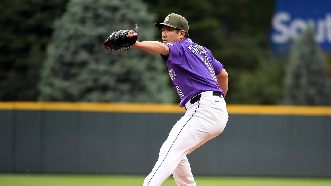 May 16, 2026; Denver, Colorado, USA;  Colorado Rockies pitcher Tomoyuki Sugano (11) pitches during the first inning against the Arizona Diamondbacks at Coors Field. 