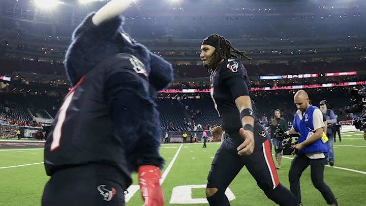 Jan 11, 2025; Houston, Texas, USA; Houston Texans quarterback C.J. Stroud (7) jogs off the field after the game against the Los Angeles Chargers in an AFC wild card game at NRG Stadium. Mandatory Credit: Troy Taormina-Imagn Images Jan 11, 2025; Houston, Texas, USA; Houston Texans quarterback C.J. Stroud (7) jogs off the field after the game against the Los Angeles Chargers in an AFC wild card game at NRG Stadium. Mandatory Credit: Troy Taormina-Imagn Images