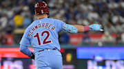 Oct 8, 2025; Los Angeles, California, USA; Philadelphia Phillies designated hitter Kyle Schwarber (12) celebrates after hitting a two run home run during the eighth inning against the Los Angeles Dodgers during game three of the NLDS round for the 2025 MLB playoffs at Dodger Stadium. Mandatory Credit: Jayne Kamin-Oncea-Imagn Images