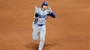 Shohei Ohtani rounds the bases after hitting a three-run home run against the New York Mets.