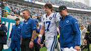 Dec 7, 2025; Jacksonville, Florida, USA; Indianapolis Colts quarterback Daniel Jones (17) leaves the field with an apparent injury against the Jacksonville Jaguars during the first half at EverBank Stadium. 