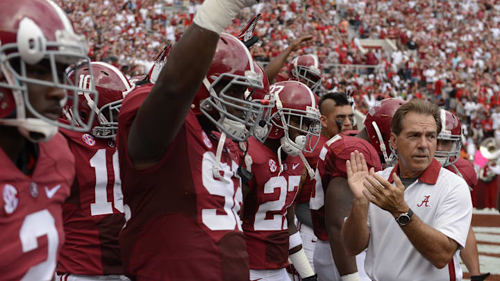 September 8, 2012; Tuscaloosa, AL, USA;  Alabama Crimson Tide head coach Nick Saban leads his players onto the field before the start of their game against the Western Kentucky Hilltoppers at Bryant Denny Stadium. 