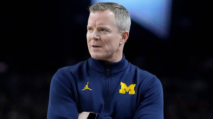 Michigan Wolverines head coach Dusty May watches Saturday, April 4, 2026, during a Final Four game against the Arizona Wildcats at Lucas Oil Stadium in Indianapolis.