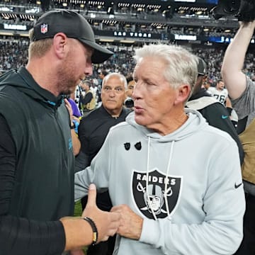 Nov 2, 2025; Paradise, Nevada, USA; The Jacksonville Jaguars head coach Liam Coen and the Las Vegas Raiders head coach Pete Carroll meet after the win against the Las Vegas Raiders at Allegiant Stadium. Mandatory Credit: Kirby Lee-Imagn Images