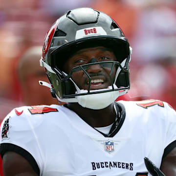 Sep 8, 2024; Tampa, Florida, USA; Tampa Bay Buccaneers wide receiver Chris Godwin (14) looks on against the Washington Commanders works out prior to the game at Raymond James Stadium. Mandatory Credit: Kim Klement Neitzel-Imagn Images