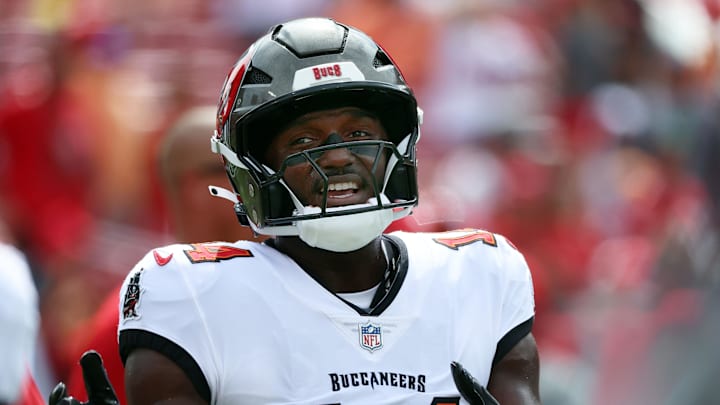 Sep 8, 2024; Tampa, Florida, USA; Tampa Bay Buccaneers wide receiver Chris Godwin (14) looks on against the Washington Commanders works out prior to the game at Raymond James Stadium. Mandatory Credit: Kim Klement Neitzel-Imagn Images