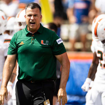 Aug 31, 2024; Gainesville, Florida, USA; Miami Hurricanes head coach Mario Cristobal reacts before a game against the Florida Gators at Ben Hill Griffin Stadium. Mandatory Credit: Matt Pendleton-USA TODAY Sports