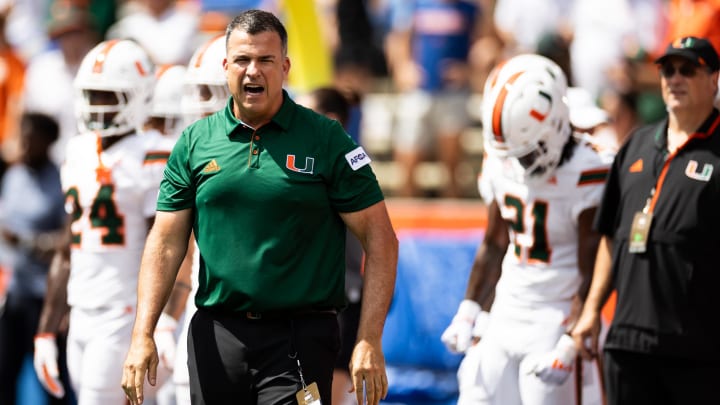 Aug 31, 2024; Gainesville, Florida, USA; Miami Hurricanes head coach Mario Cristobal reacts before a game against the Florida Gators at Ben Hill Griffin Stadium. Mandatory Credit: Matt Pendleton-USA TODAY Sports