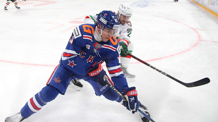 Ivan Demidov (91) of SKA, and Semyon Koshelev (21) of Ak...