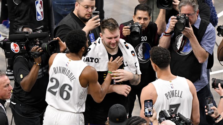 Los Angeles Lakers guard Luka Doncic and Dallas Mavericks guard Spencer Dinwiddie after their NBA regular season game
