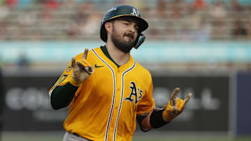 Jun 30, 2025; Tampa, Florida, USA;  Athletics catcher Shea Langeliers (23) hits a three-run home run against the Tampa Bay Rays during the first inning at George M. Steinbrenner Field. Mandatory Credit: Kim Klement Neitzel-Imagn Images