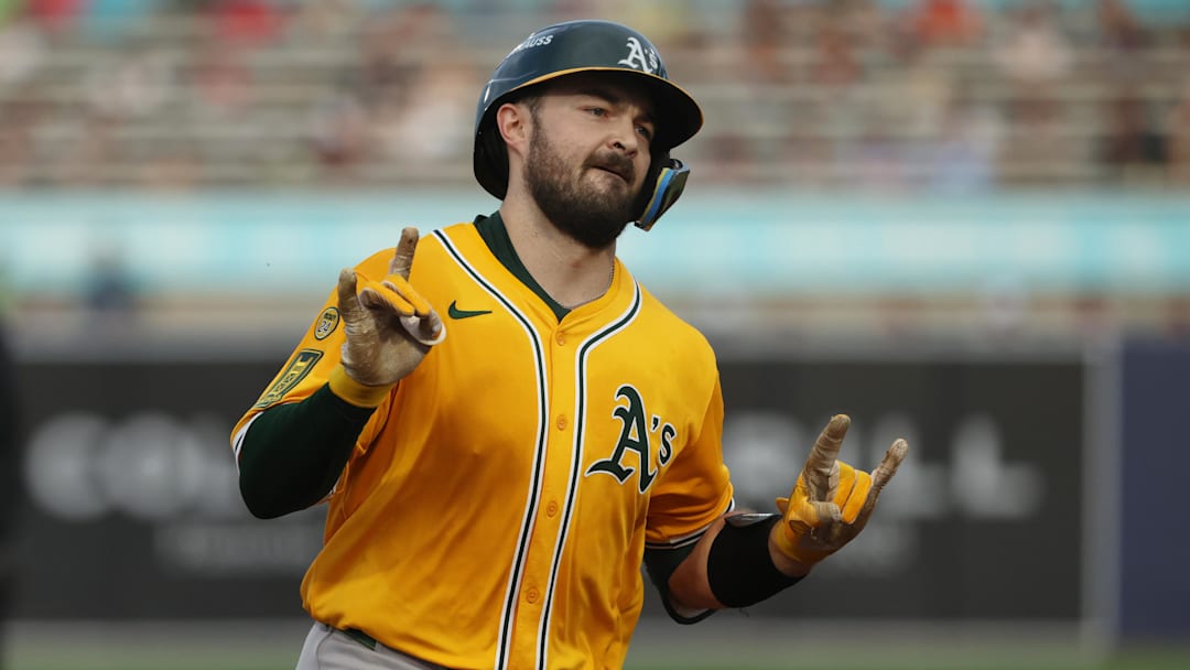 Jun 30, 2025; Tampa, Florida, USA;  Athletics catcher Shea Langeliers (23) hits a three-run home run against the Tampa Bay Rays during the first inning at George M. Steinbrenner Field. Mandatory Credit: Kim Klement Neitzel-Imagn Images