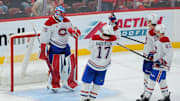 Dec 28, 2024; Sunrise, Florida, USA; Montreal Canadiens goaltender Jakub Dobes (75) celebrates with right wing Josh Anderson (17), defenseman Alexandre Carrier (45) and defenseman Kaiden Guhle (21) after the game against the Florida Panthers at Amerant Bank Arena. Mandatory Credit: Sam Navarro-Imagn Images