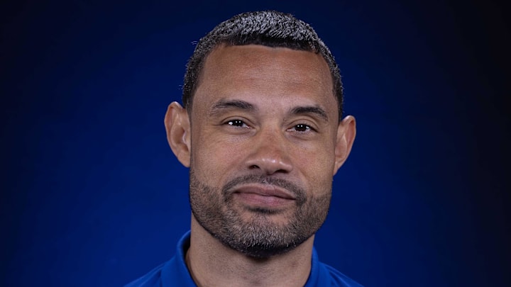 Sep 30, 2024; Detroit, MI, USA; Detroit Pistons president of basketball operations Trajan Langdon poses for his official 2024-25 season head shot. Mandatory Credit: David Reginek-Imagn Images