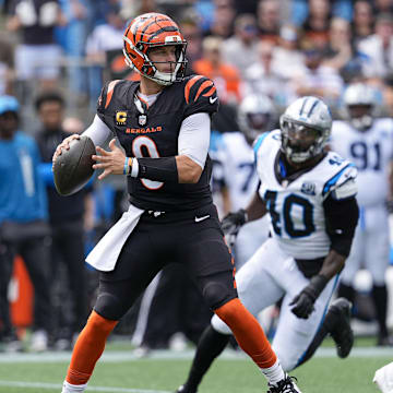 Sep 29, 2024; Charlotte, North Carolina, USA; Cincinnati Bengals quarterback Joe Burrow (9) makes a throw during 1st quarter against the Carolina Panthers at Bank of America Stadium. Mandatory Credit: Jim Dedmon-Imagn Images
