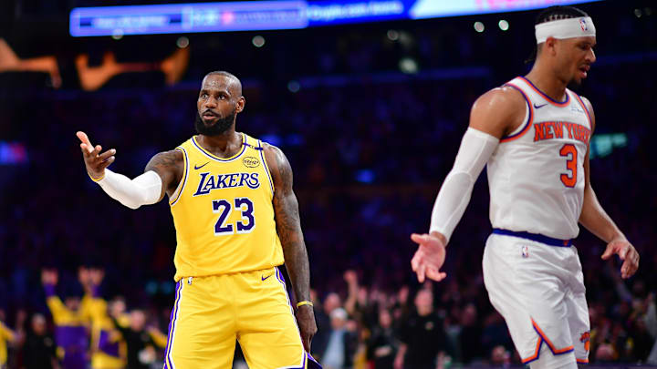 Los Angeles Lakers forward LeBron James reacts against the New York Knicks during the second half at Crypto.com Arena. Los Angeles Lakers forward LeBron James reacts against the New York Knicks during the second half at Crypto.com Arena.