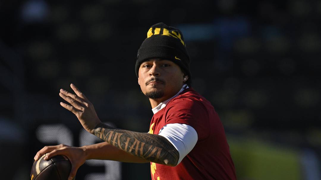 Nov 22, 2025; Eugene, Oregon, USA; Southern California Trojans quarterback Jayden Maiava (14) warms up before the game against the Oregon Ducks at Autzen Stadium.
