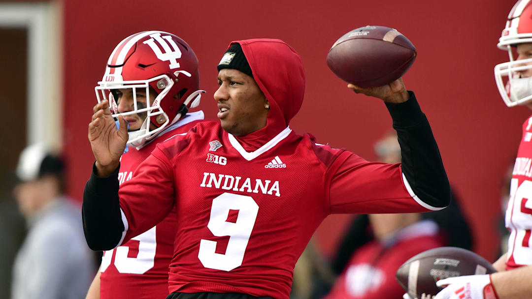 Nov 20, 2021; Bloomington, Indiana, USA;  Indiana Hoosiers quarterback Michael Penix Jr. (9) is seen out with the team during warms up before the game against the Minnesota Golden Gophers at Memorial Stadium. Mandatory Credit: Marc Lebryk-Imagn Images