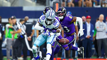 Sep 22, 2024; Arlington, Texas, USA;  Baltimore Ravens cornerback Nate Wiggins (2) knocks the ball out of the hands of Dallas Cowboys wide receiver CeeDee Lamb (88) during the first half at AT&T Stadium. Mandatory Credit: Kevin Jairaj-Imagn Images