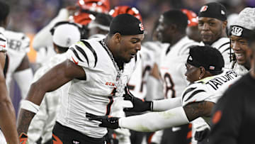 Nov 7, 2024; Baltimore, Maryland, USA; Cincinnati Bengals wide receiver Ja'Marr Chase (1) celebrates with  cornerback Cam Taylor-Britt (29) after scoring a touchdown during the second half against the Baltimore Ravens at M&T Bank Stadium. Mandatory Credit: Tommy Gilligan-Imagn Images