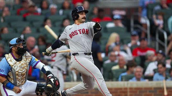 May 16, 2026; Atlanta, Georgia, USA; Boston Red Sox catcher Mickey Gasper (30) hits a single against the Atlanta Braves in the fourth inning at Truist Park. Mandatory Credit: Brett Davis-Imagn Images
