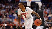 Mar 22, 2014; Orlando, FL, USA; Louisville Cardinals guard Russ Smith (2) drives to the basket against the Saint Louis Billikens in the first half of a men's college basketball game during the third round of the 2014 NCAA Tournament at Amway Center. Mandatory Credit: Kim Klement-Imagn Images