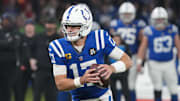 Nov 9, 2025; Berlin, Germany; Indianapolis Colts quarterback Daniel Jones (17) runs the ball against the Atlanta Falcons during the NFL Berlin Game at Olympic Stadium. 