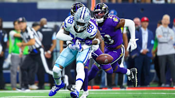 Sep 22, 2024; Arlington, Texas, USA;  Baltimore Ravens cornerback Nate Wiggins (2) knocks the ball out of the hands of Dallas Cowboys wide receiver CeeDee Lamb (88) during the first half at AT&T Stadium. Mandatory Credit: Kevin Jairaj-Imagn Images