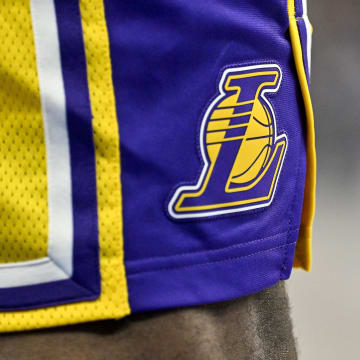 Dec 12, 2023; Dallas, Texas, USA; A of the logo of the Los Angeles Lakers on the shorts of forward LeBron James (23)  during the game between the Dallas Mavericks and the Los Angeles Lakers at the American Airlines Center. Mandatory Credit: Jerome Miron-USA TODAY Sports