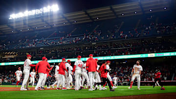 Jun 10, 2025; Anaheim, California, USA; Los Angeles Angels celebrate after first baseman Nolan Schanuel (18) hits a walk off RBI single against the Athletics during the tenth inning at Angel Stadium. Mandatory Credit: Gary A. Vasquez-Imagn Images