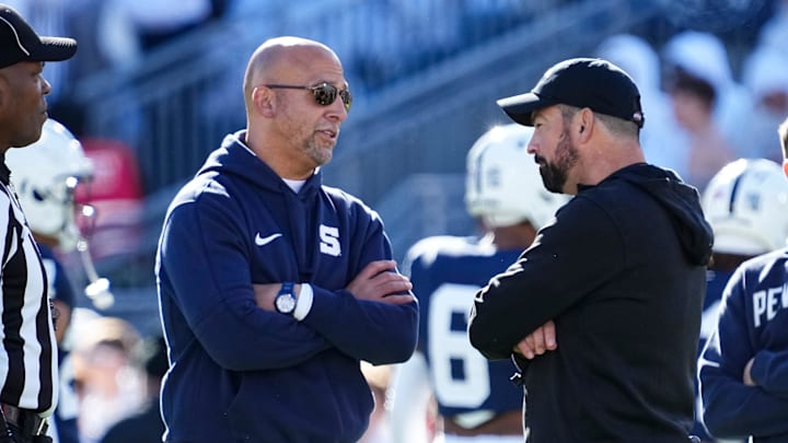 Ohio State Buckeyes head coach Ryan Day talks to Penn State Nittany Lions head coach James Franklin prior to the NCAA football game at Beaver Stadium in University Park, Pa. on Saturday, Nov. 2, 2024.