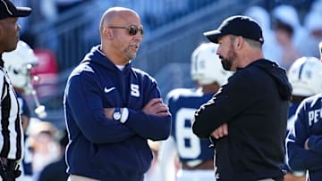 Ohio State Buckeyes head coach Ryan Day talks to Penn State Nittany Lions head coach James Franklin