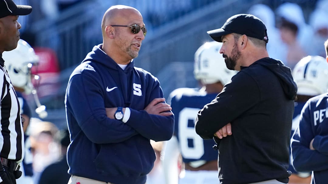 Ohio State Buckeyes head coach Ryan Day talks to Penn State Nittany Lions head coach James Franklin