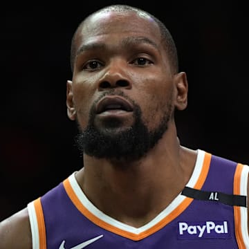 Mar 26, 2025; Phoenix, Arizona, USA; Phoenix Suns forward Kevin Durant (35) looks on against the Boston Celtics during the second half at Footprint Center. Mandatory Credit: Rick Scuteri-Imagn Images