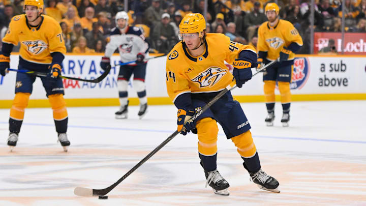 Oct 9, 2025; Nashville, Tennessee, USA; Nashville Predators center Brady Martin (44) skates with the puck against the Columbus Blue Jackets during the second period at Bridgestone Arena.