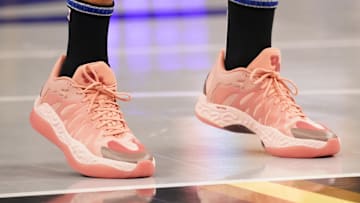 Golden State Warriors guard Stephen Curry wears the PUMA Hali 1 'Hibiscus' colorway.