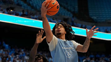 Oct 12, 2024; Chapel Hill, NC, USA;  North Carolina Tar Heels guard Elliot Cadeau (3) shoots in the first half at the Dean E. Smith Center. Mandatory Credit: Bob Donnan-Imagn Images