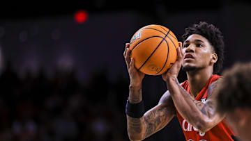 Mar 5, 2025; Cincinnati, Ohio, USA; Cincinnati Bearcats forward Dillon Mitchell (23) shoots a free throw against the Kansas State Wildcats in the first half at Fifth Third Arena. Mandatory Credit: Katie Stratman-Imagn Images