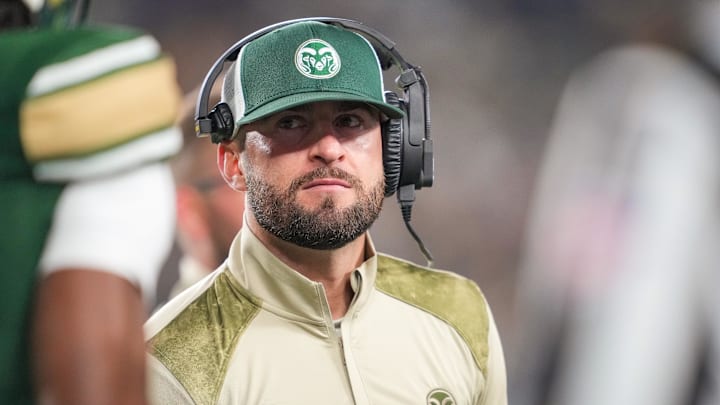 Nov 11, 2023; Fort Collins, Colorado, USA; Colorado State Rams assistant coach - wide receivers Chad Savage talks to his team during the second quarter against the San Diego State Aztecs at Sonny Lubick Field at Canvas Stadium. Mandatory Credit: Andrew Wevers-Imagn Images Nov 11, 2023; Fort Collins, Colorado, USA; Colorado State Rams assistant coach - wide receivers Chad Savage talks to his team during the second quarter against the San Diego State Aztecs at Sonny Lubick Field at Canvas Stadium. Mandatory Credit: Andrew Wevers-Imagn Images